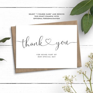 May include: A white card with black text that says "thank you" with a heart symbol and "for being part of our special day".