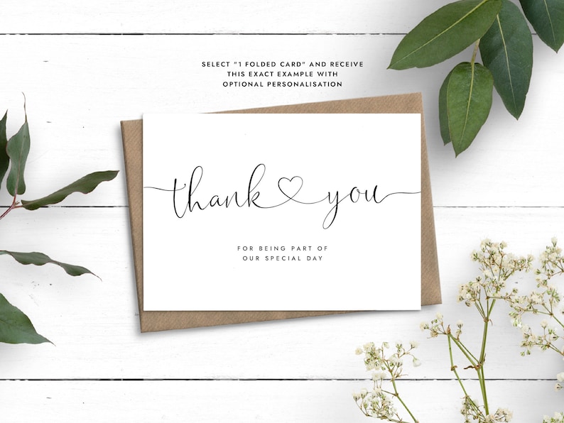May include: A white card with black text that says "thank you" with a heart symbol and "for being part of our special day".