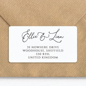 May include: White return address label with black calligraphy that reads "Ellie & Liam" and the address "35 Nowhere Drive, Woodhouse, Sheffield S30 R35L, United Kingdom."