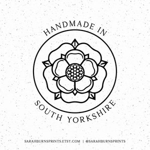 May include: A black and white circular logo with a floral emblem, surrounded by the text "HANDMADE IN SOUTH YORKSHIRE." The design includes the website address and social media handle of the seller.