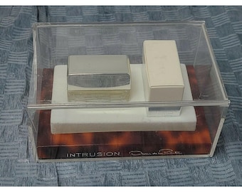 Intrusion Oscar De La Renta .16 oz Eau De Parfum Mini Perfume in Collector Case