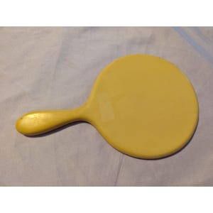 Vintage Yellow Celluloid Handheld Vanity Mirror With Round Design