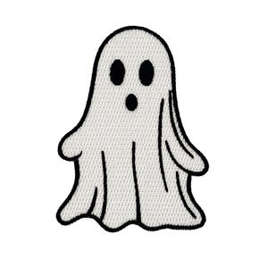 May include: Embroidered patch of a friendly ghost. The ghost is white with black eyes and a mouth, outlined in black. The design is a simple, cartoon-style illustration, perfect for Halloween or spooky-themed crafts.