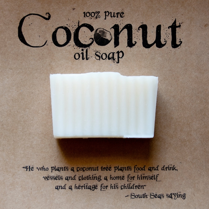 May include: A white bar of coconut oil soap on a brown paper background. The text "100% pure Coconut oil soap" is printed above the soap. The text "He who plants a coconut tree plants food and drink, vessels and clothing, a home for himself and a heritage for his children" -South Seas saying is printed below the soap.