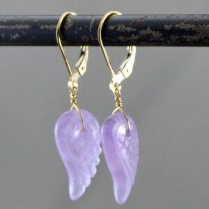 Amethyst angel wing earrings. image 1