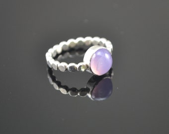 Flat dots band ring with purple chalcedony cabochon.