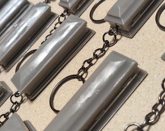 Grey Casket key chain