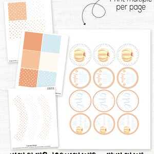 May include: Printable set of pumpkin-themed party decorations in orange, blue, and white. Includes cupcake wrappers, circle stickers, and a printable sheet with multiple designs. The text on the stickers reads "Happy 1st Birthday Easton".