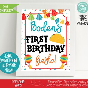May include: A printable sign for a first birthday party with a fiesta theme. The sign is white with colorful confetti and a banner of flags. It says "Boden's First Birthday fiesta!" with a taco and maracas.