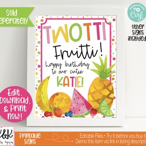 May include: A printable birthday sign with a colorful fruit theme. The sign says "TWOTTI Fruitti! Happy birthday to our cutie KATIE!"