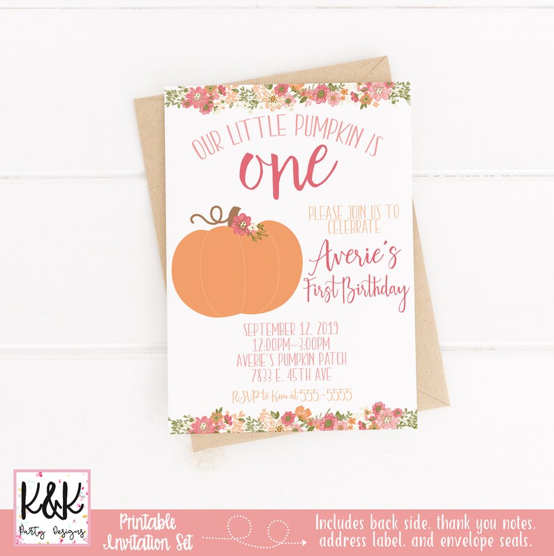 May include: Printable invitation set for a first birthday party with a pumpkin theme. The invitation features a cute orange pumpkin with a pink flower on top and the text "Our little pumpkin is one". The invitation also includes the date, time, and location of the party.