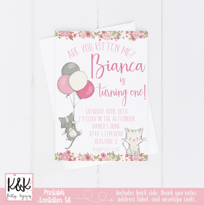 May include: Pink and gray printable invitation for a first birthday party. The invitation features a cat holding balloons and the text "Are you kitten me? Bianca is turning one!" with party details below.
