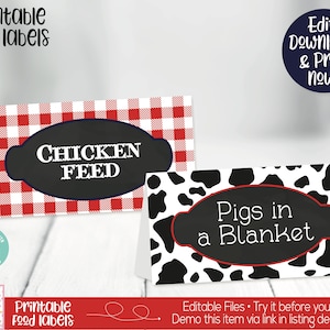 May include: Printable food labels with a red and white gingham pattern and a black and white cow print pattern. The labels say "Chicken Feed" and "Pigs in a Blanket".