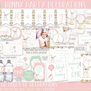 May include: A set of printable party decorations for a first birthday with a bunny theme. The decorations feature a pink and green colour scheme with floral accents. The set includes a banner, cupcake wrappers, food labels, party signs, and more.