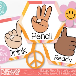 Può includere: Un set di sei carte stampabili che mostrano segnali con le mani per istruzioni comuni in classe. Le carte sono colorate e presentano un segno di pace, una mano che fa la lettera 'P' per 'matita', una mano che fa la lettera 'D' per 'bere', una mano che fa la lettera 'R' per 'pronto', e un pollice in su.