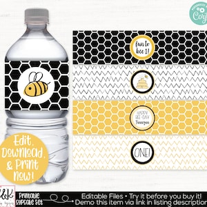 May include: Printable water bottle labels with a bee theme. The labels feature a honeycomb pattern, a bee, and the text "fun to bee 1!"  "HAPPY BEE-DAY Finnegan" and "ONE!"
