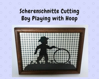 Vintage Framed Handmade Scherenschnitte Paper Cutting of Boy Playing with Hoop 1992