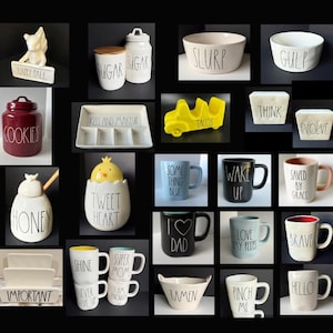 May include: A collection of ceramic kitchenware including mugs, bowls, canisters, and trays featuring black handwritten-style text such as Sugar, Cookies, Slurp, Gulp, Tacos, Think, Evolve, Honey, Tweet Heart, Dad, Brave, Hello, and Important.