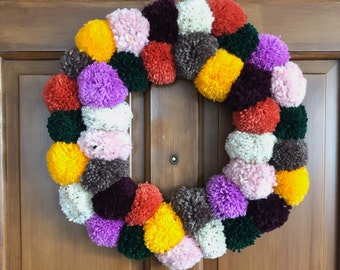 14in Handmade Yarn Pom Pom Door Wreath, Multi Color