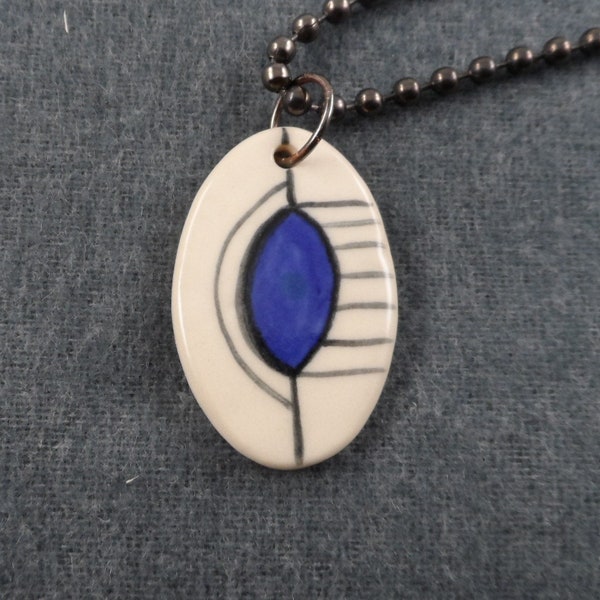 White and blue abstract design ceramic pendant and chain necklace