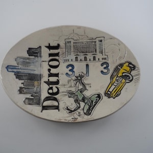 Oval 313, Detroit ceramic dish from Merging Story Pottery. Spirit of Detroit, skyline, train station and mustang. Free shipping included