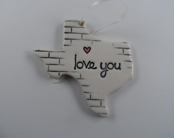 Love You Texas state ornament with heart from Merging Story Pottery. Price includes shipping