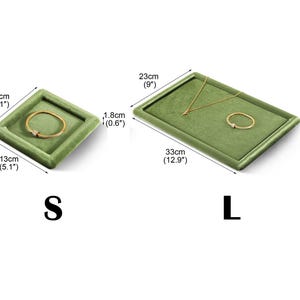 May include: Two green velvet jewelry trays, labeled S and L. The S tray is square, 5.1 inches wide, and holds a gold bracelet. The L tray is rectangular, 12.9 inches long, and holds a gold necklace and ring.