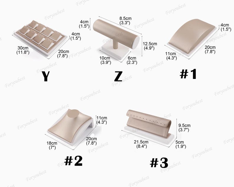 May include: Set of five jewelry display stands in a light beige color. The stands are made of foam and have a variety of shapes and sizes. The stands are labeled #1, #2, #3, Y, and Z. The stands are ideal for displaying necklaces, bracelets, rings, and earrings.