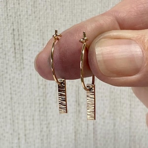 Small hoop earrings with textured vertical bar charms, 3/4 inch wire hoop earrings with little dangling rectangles, gold minimalist jewelry