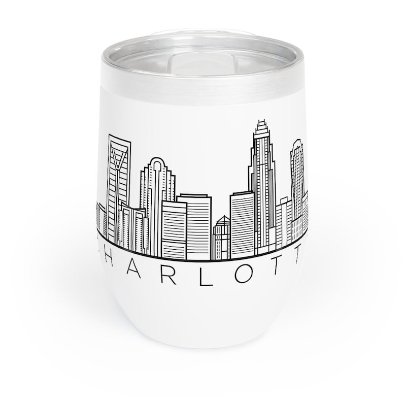 May include: White stainless steel tumbler with a black and white skyline of Charlotte, North Carolina. The text "CHARLOTTE" is printed below the skyline.