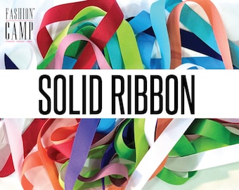 May include: A collection of solid-colored ribbons in various hues, including red, pink, orange, green, blue, and white. The ribbons are arranged in a visually appealing display, with the text "SOLID RIBBON" prominently displayed in bold, black letters.