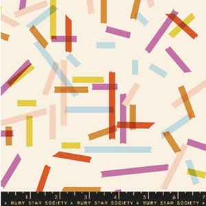 May include: Cream-colored fabric with a repeating pattern of colorful, overlapping rectangles. The rectangles are in shades of orange, yellow, pink, purple, and blue. The text "RUBY STAR SOCIETY" is printed at the bottom.