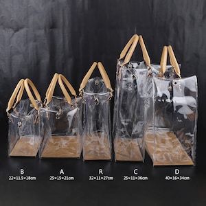 Paquete de 2 bolsas de regalo transparentes con asa, bolsas de regalo de  PVC transparente de 11 x 4 x 10 pulgadas, bolsa de plástico grande, bolsa  de