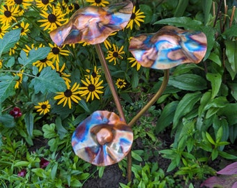 Copper toadstools garden feature