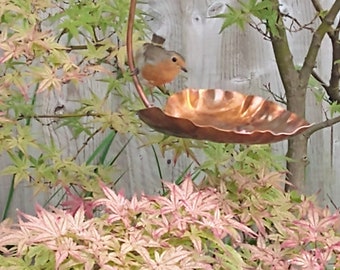 Copper hanging bird feeder