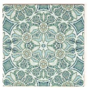 May include: A square ceramic tile featuring a repeating pattern of blue and green floral designs. The tile has a white background and a subtle shimmer.