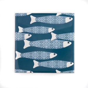Teal "fish shoal" ceramic tile, ocean pattern ceramic tiles, dramatic back splash, unique fish school tiles, character tiles, blue green