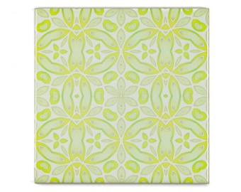 Yellow green tiles, decorative pattern tile, lemon apple millefiori design, delicate splashback tiles, zingy feature wall, bathroom tiles