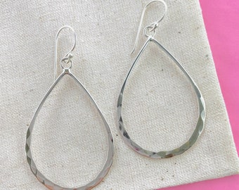 battered silver earrings