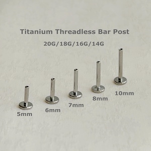 May include: Five silver titanium threadless bar posts of varying lengths, labeled 5mm, 6mm, 7mm, 8mm, and 10mm. The text "Titanium Threadless Bar Post" and "20G/18G/16G/14G" are above the posts.