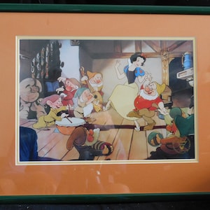 Disney Snow White Lithograph 1994 Which is Matted and Framed is a Collectible Piece that  Features Iconic Scenes Classic Animated Film