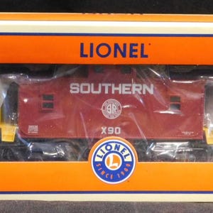 The Lionel 6-36536 Southern Caboose Operating Couplers Red