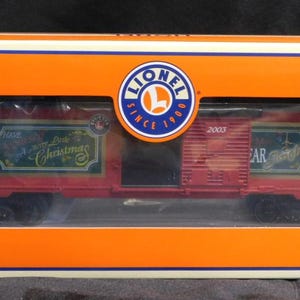 The Lionel 6-39249 LRRC Christmas 2003 Box Car is a Festive Addition to O-gauge Train Collections
