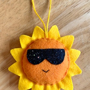 Handmade felt sunshine decoration. Summer decoration. Sunshine. Summertime. Sun with sunglasses
