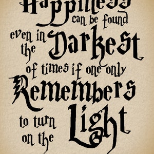 May include: A parchment-toned print featuring a quote in elegant black calligraphy. The quote reads, "Happiness can be found even in the darkest of times if one only remembers to turn on the light." Signed "Albus Dumbledore."