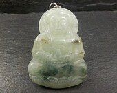 A Jadeite Jade Pendant of Guan Yin. Traditional Chinese carved jade with jump rings fitted. FREE SHIPPING.