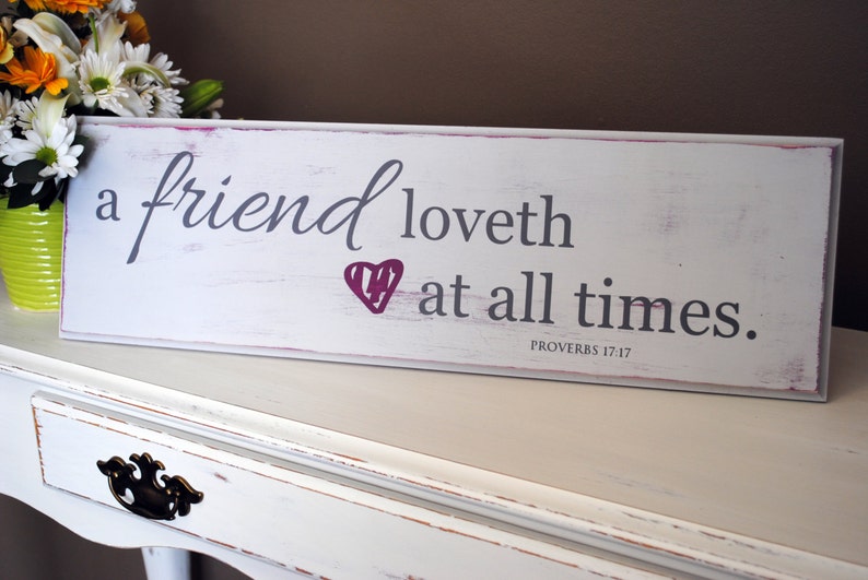 A friend loves at all times A friend loveth at all times. Perfect distressed, wood sign for your friends Proverbs 17:17 image 1