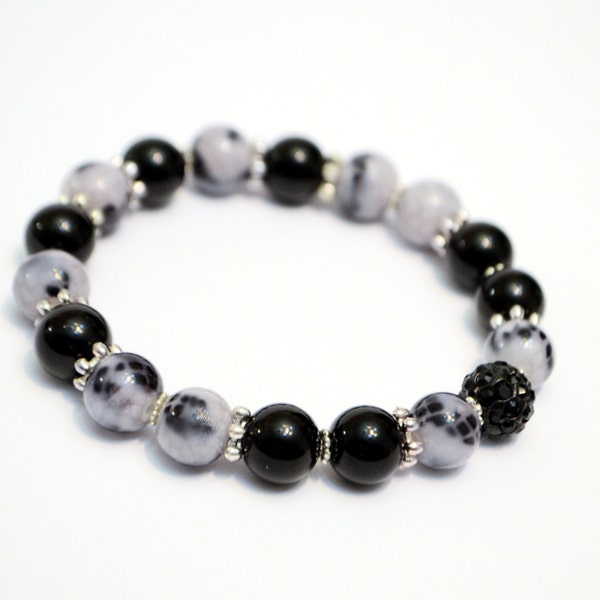 Single Row Bracelet with Black Onyx and Snake Pattern Glass Beads, Stretch Wire Unisex Bracelet with a Minimalistic Design