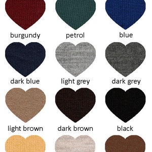 May include: A chart of 14 heart-shaped swatches showing different colors, including ecru, cyclamen, red, burgundy, petrol, blue, dark blue, light grey, dark grey, light brown, dark brown, black, mustard, beige, camel, and pale lilac.