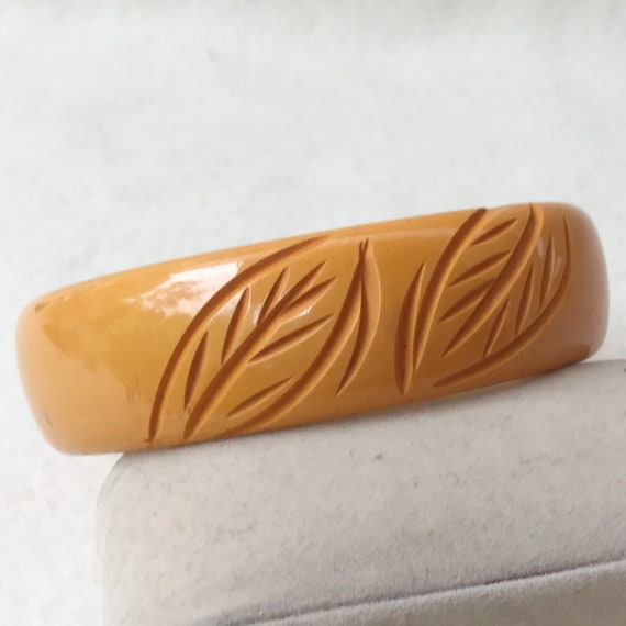 Carved Bakelite Bangle Bracelet Butterscotch Cata… - image 6